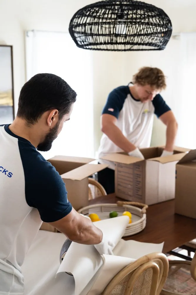 Tough Cookie crew carefully handling furniture during a Bothell move